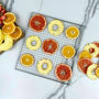 Lifestyle spread of dried fruit, vegetables, snacks and ingredients made using the Excalibur 8 Tray Select Series.